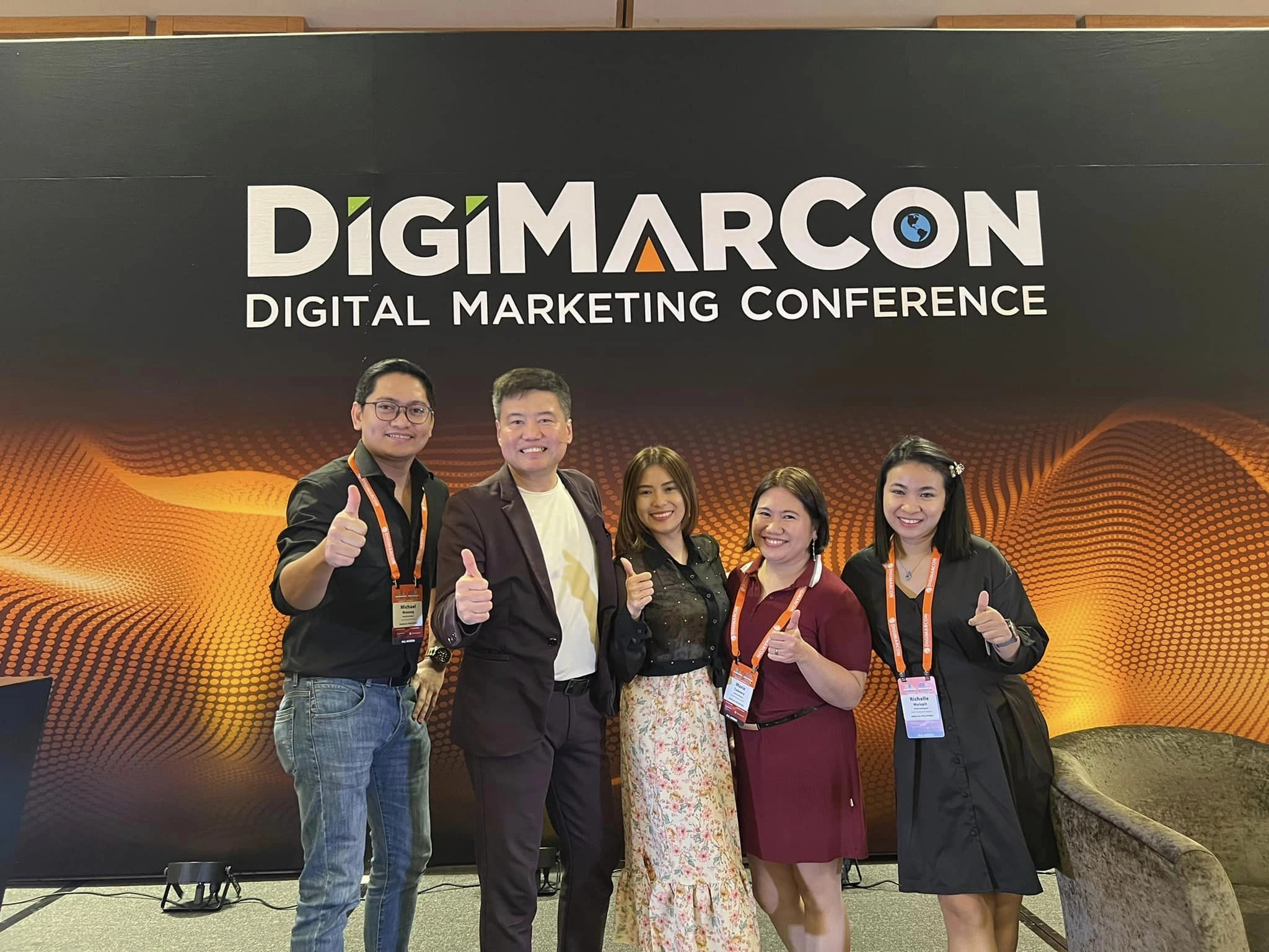 MPH team represented by Michael, the master of ceremony, Sharie, Maria, and Richelle at DigiMarcon (Digital Marketing Conference) Singapore