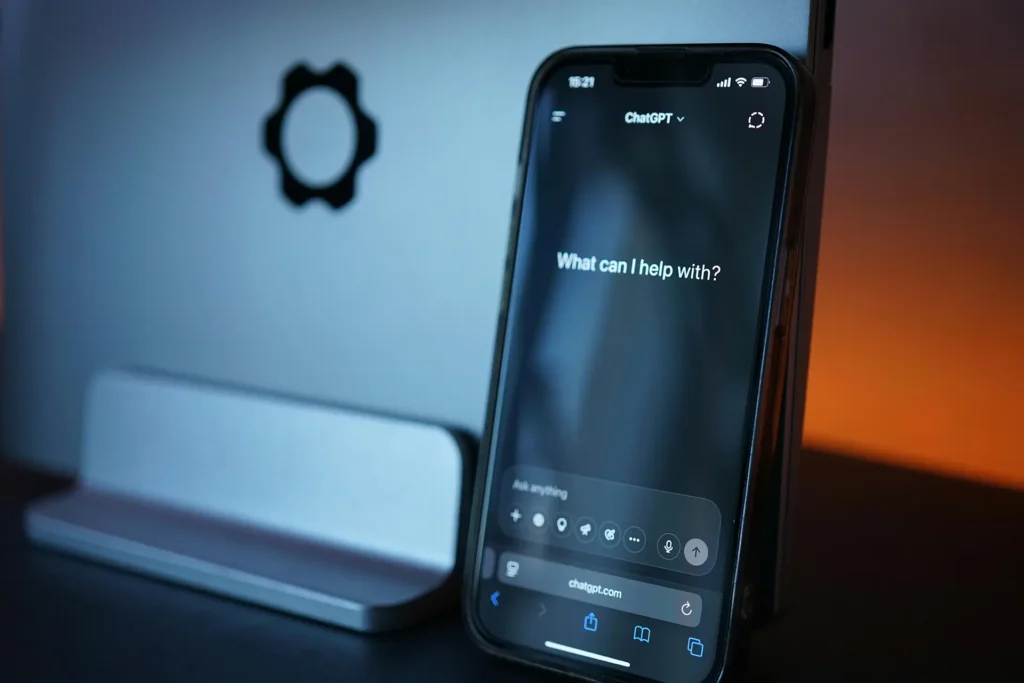 ChatGPT "How can I help with?" message displayed in a smartphone