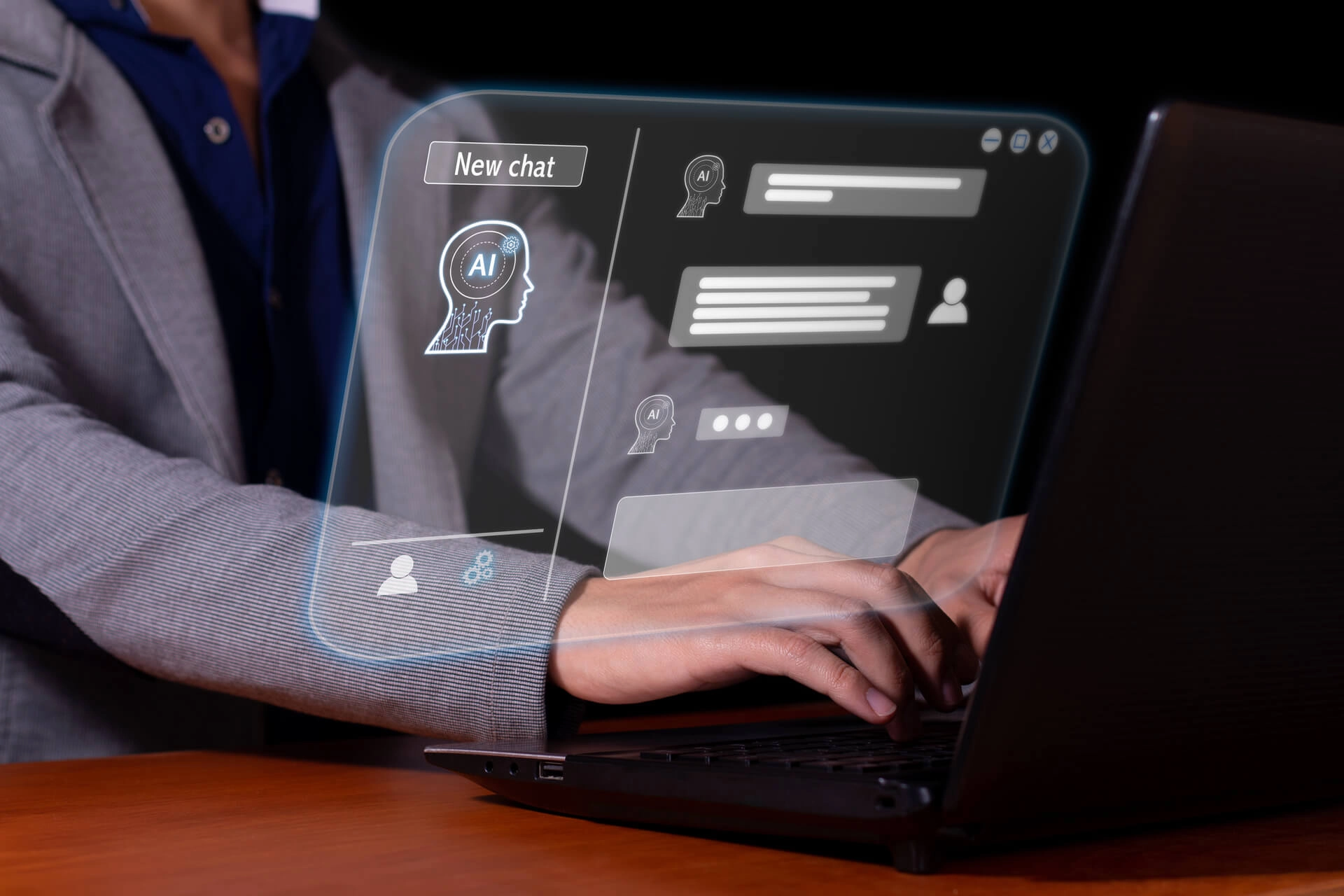Individual using a laptop with a virtual interface, highlighting developments in visual agentic AI tools and their market impact